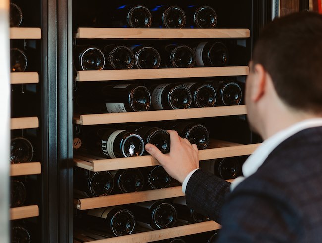 sommelier selecting wine